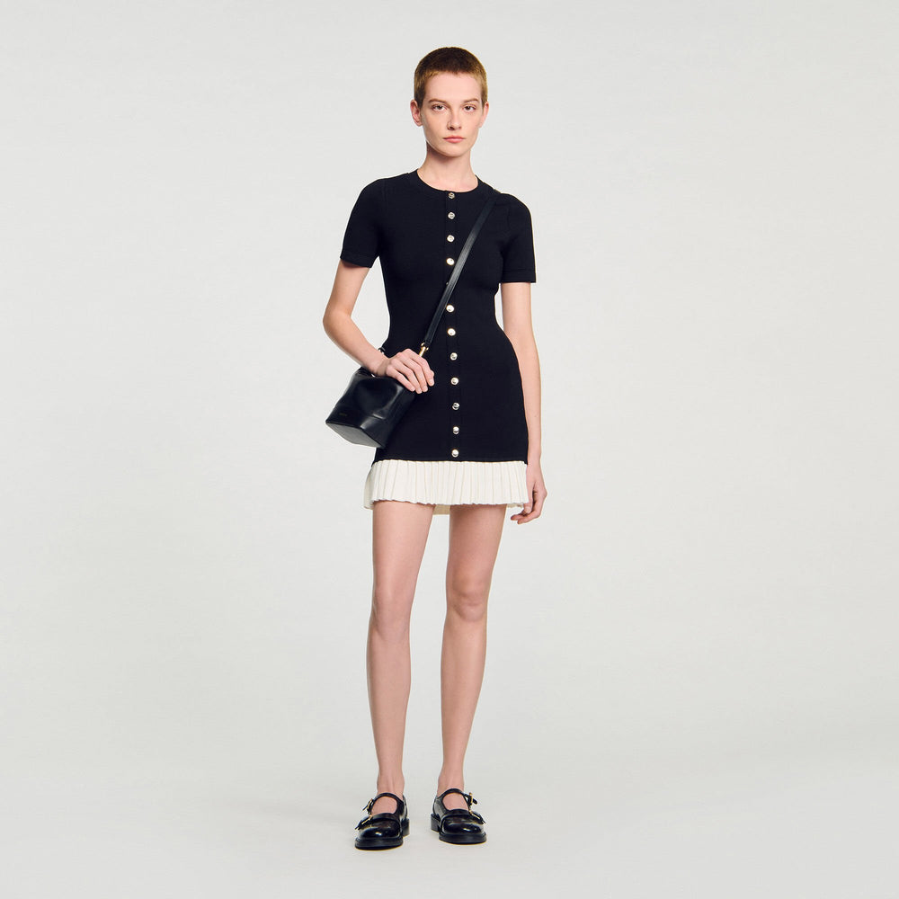 Sandro / Mini knit dress with ruffle Black / Ecru