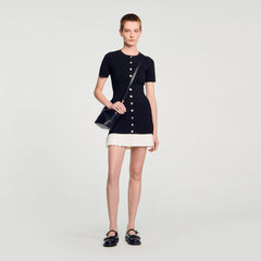 Sandro / Mini knit dress with ruffle Black / Ecru