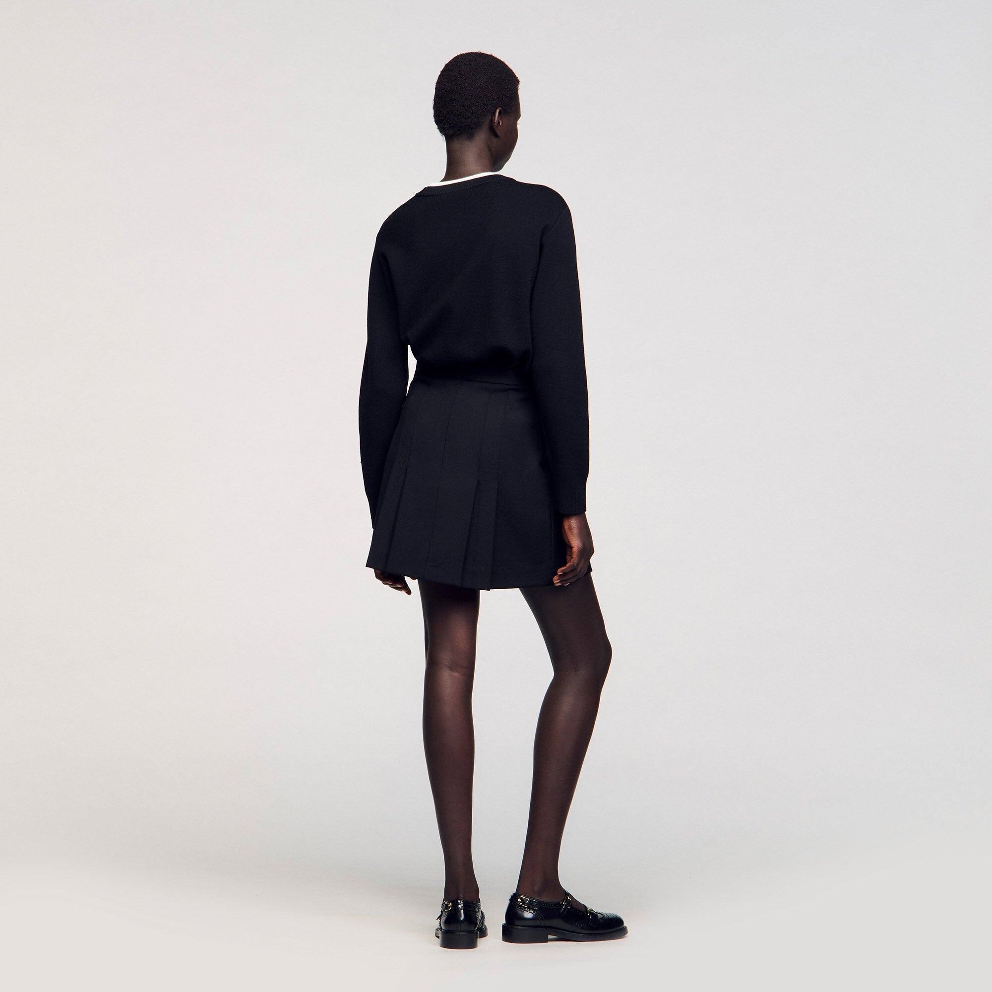 Sandro / Mini skirt with stitched pleats Black