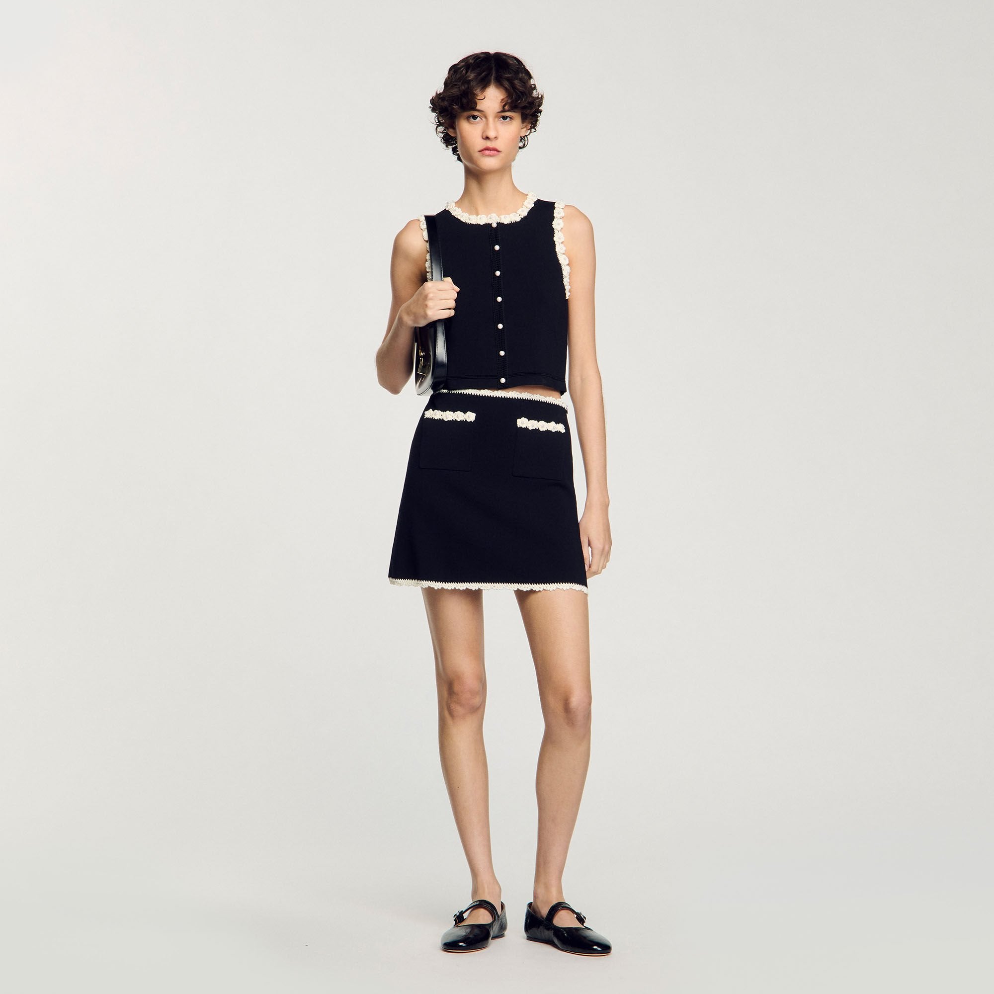 Sandro / Mini skirt with crochet details Black