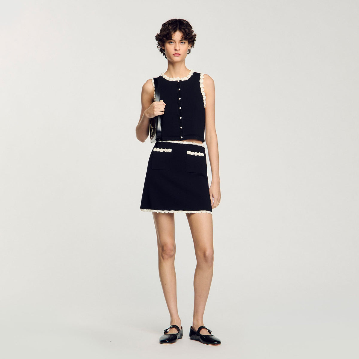 Sandro / Mini skirt with crochet details Black