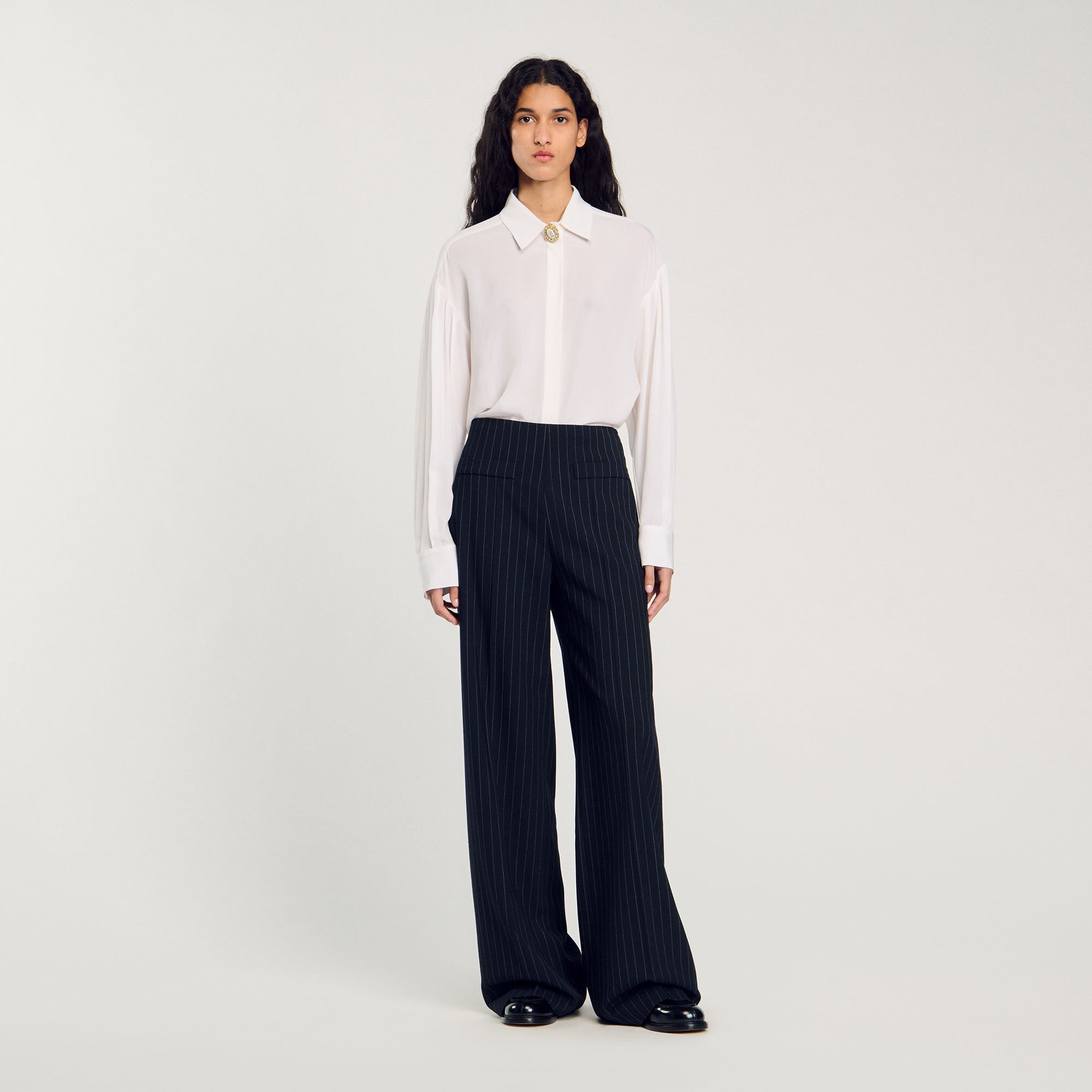 Sandro / Chalk-striped trousers Black