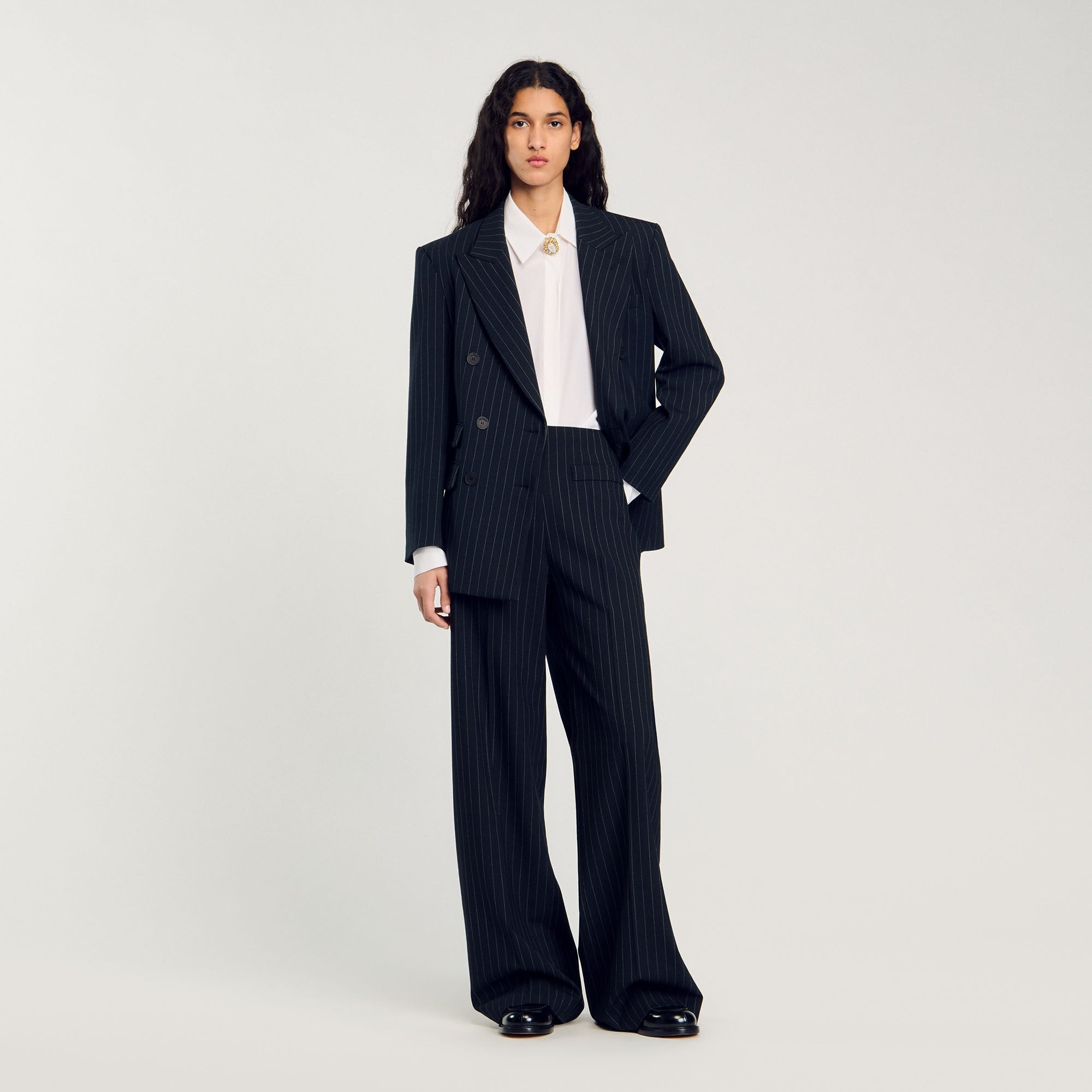 Sandro / Chalk-striped trousers Black