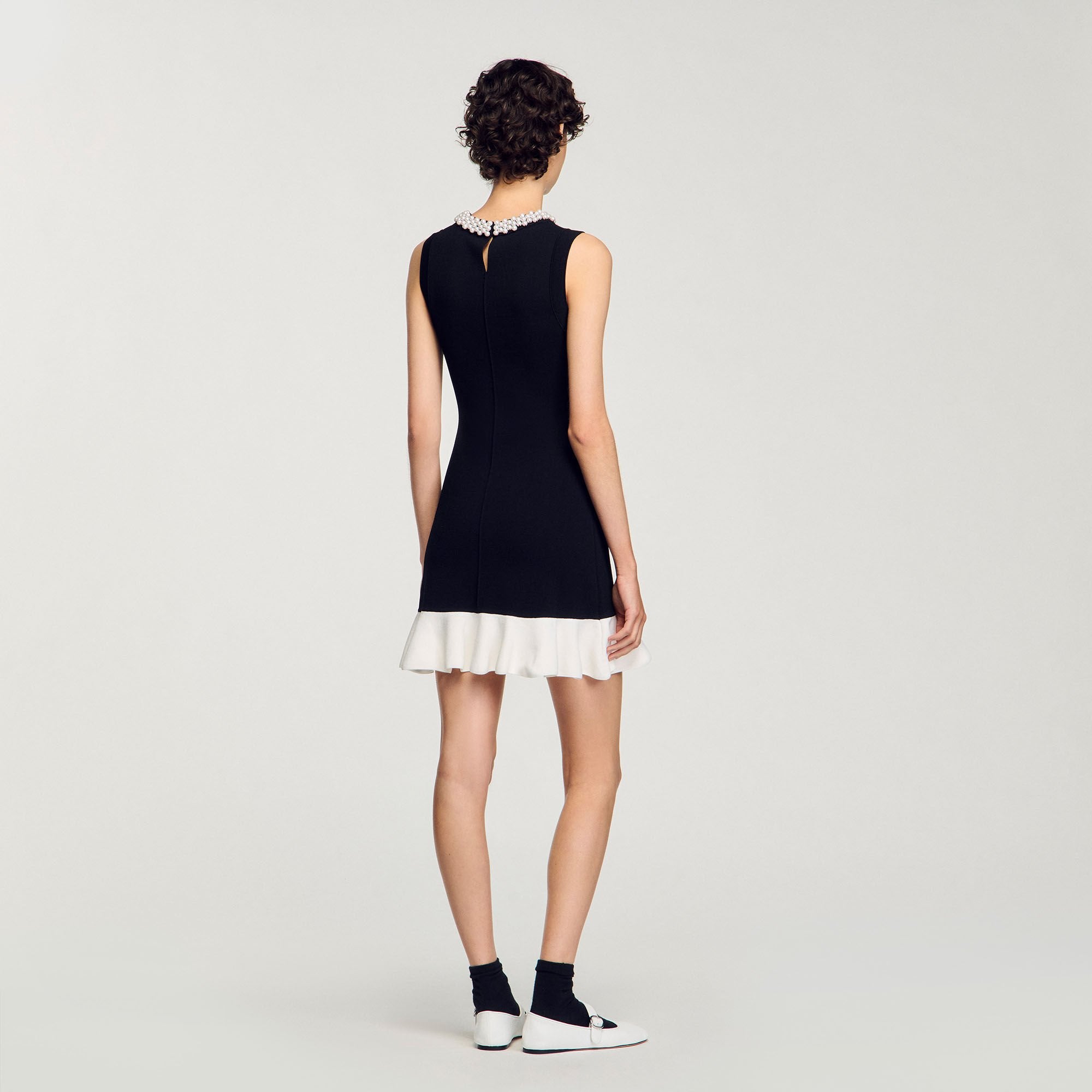 Sandro / Mini knit dress with beaded neck Black / Ecru