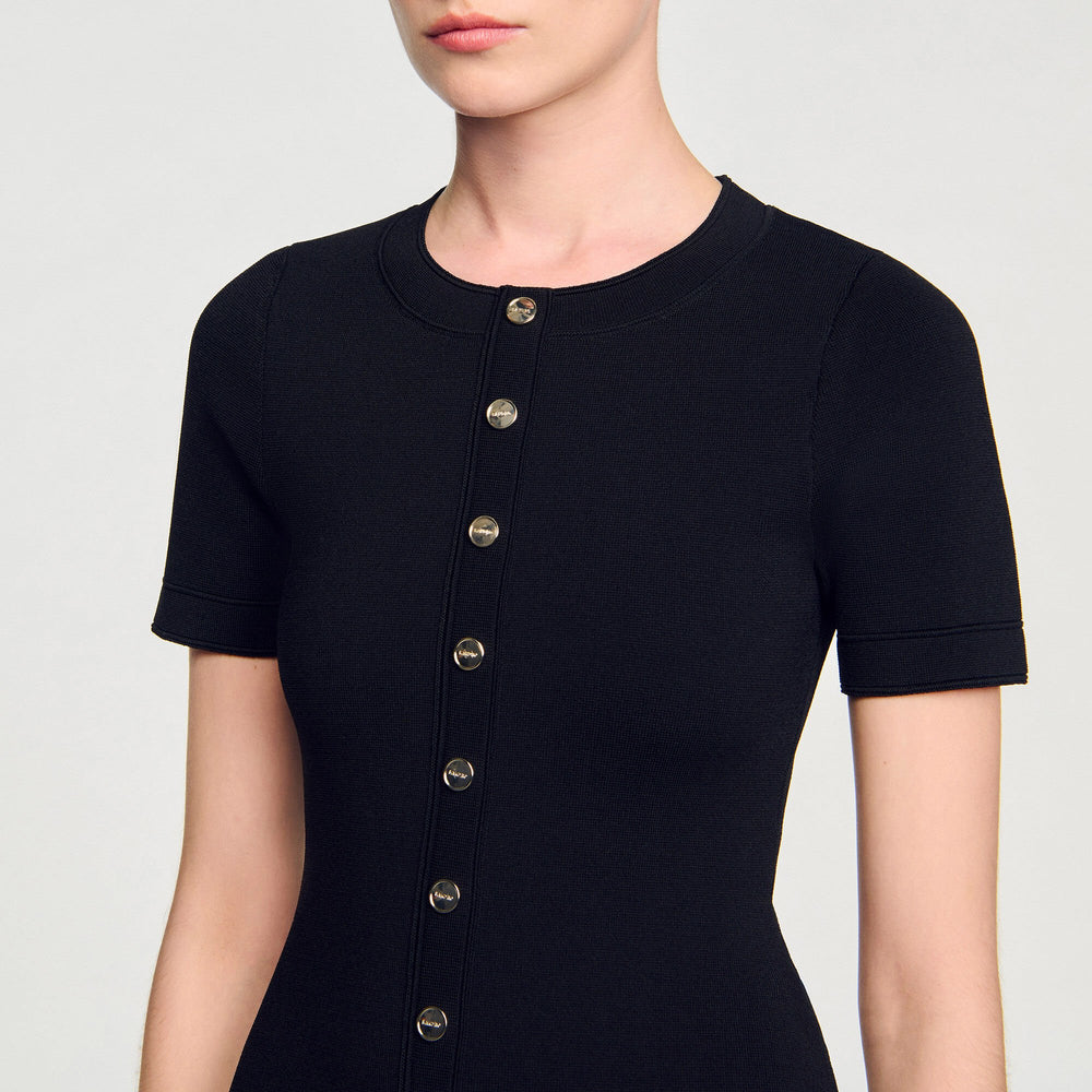Sandro / Mini knit dress with ruffle Black / Ecru
