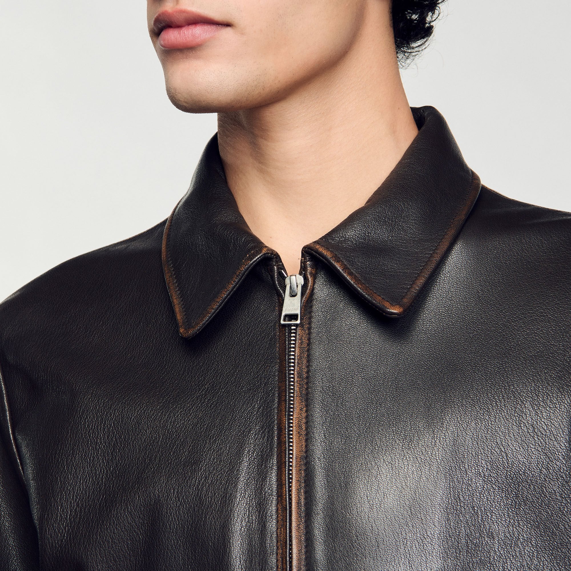 Sandro / Distressed-look leather jacket Moka.