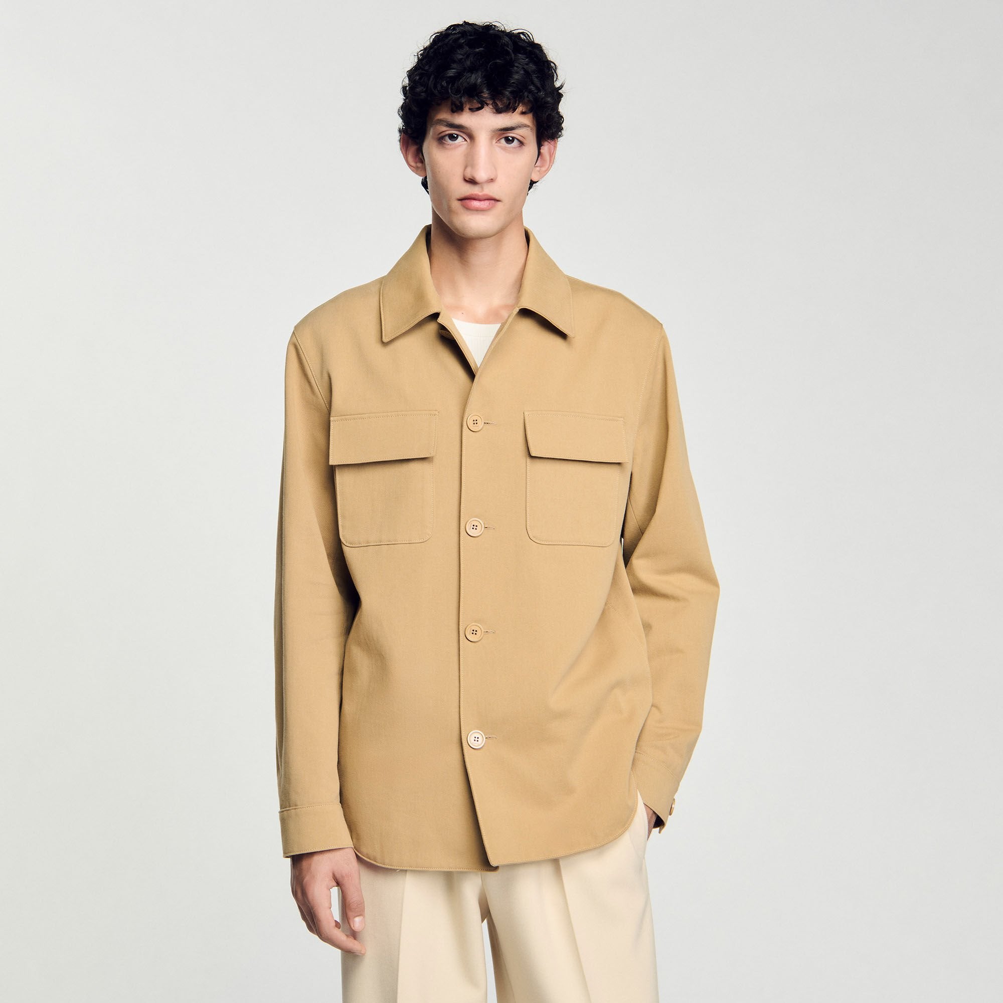 Sandro / Oversized shirt with pockets Sand.