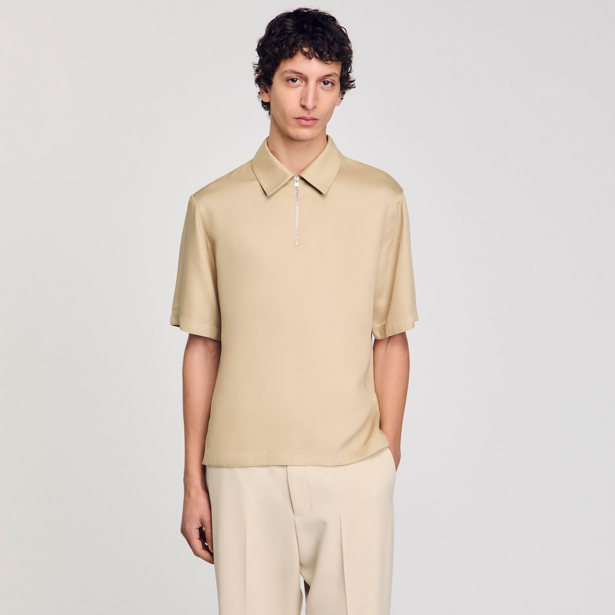 Sandro / Zip-neck polo shirt Sand.