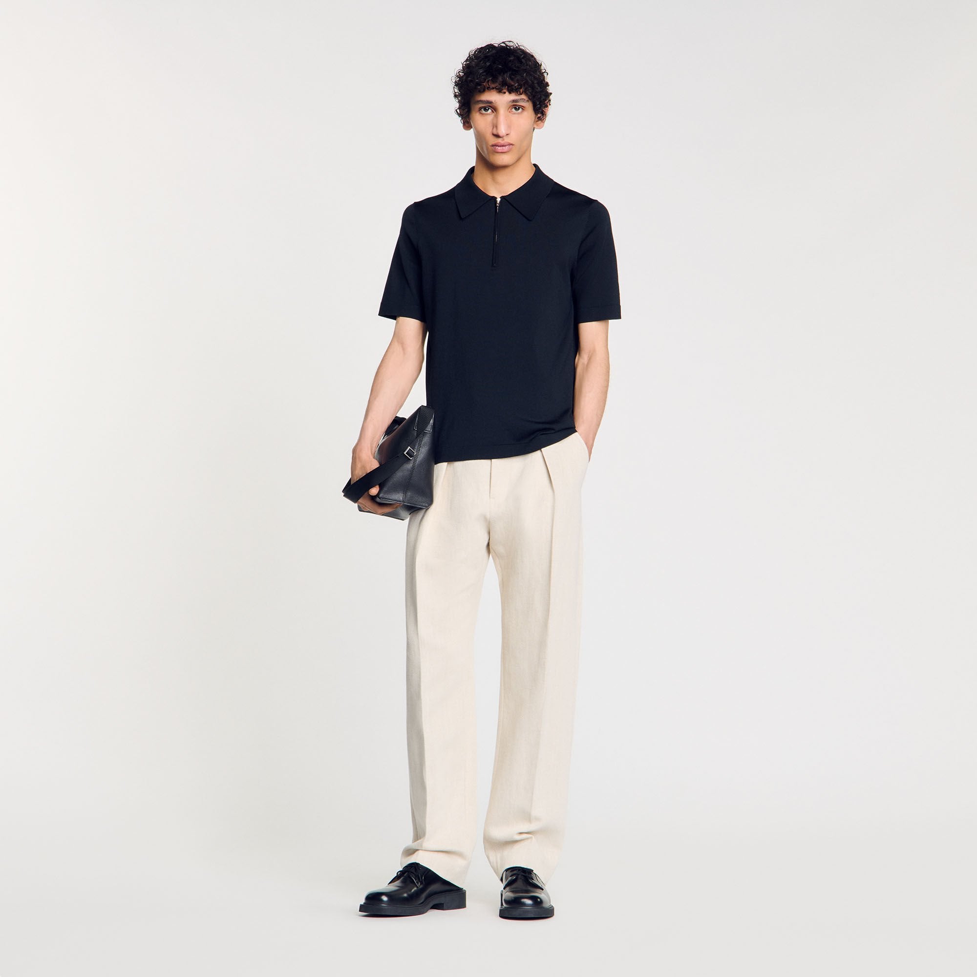 Sandro / Knitted polo shirt with zip collar Fonte