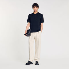 Sandro / Knitted polo shirt with zip collar Fonte