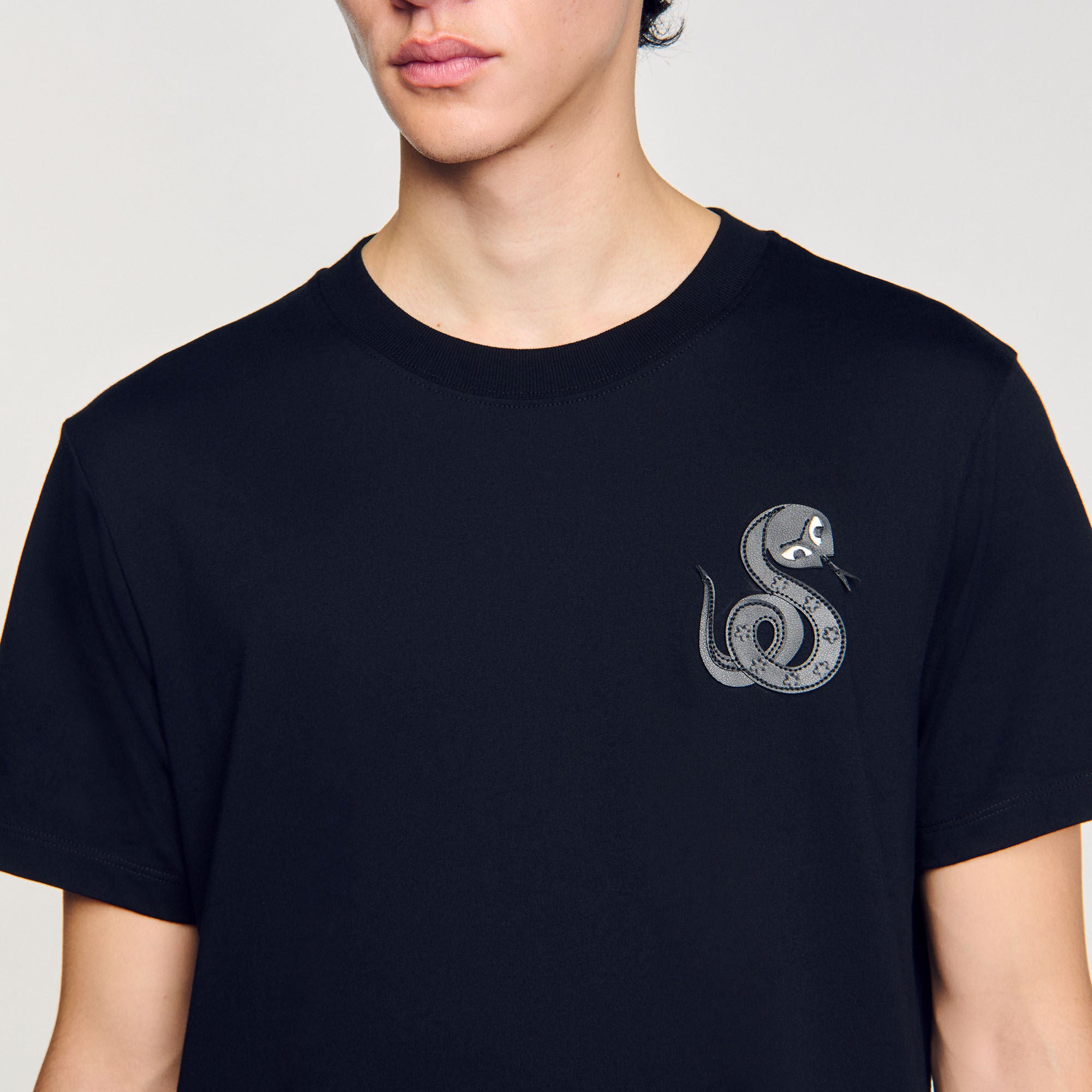 Sandro / T-shirt with snake detail Black